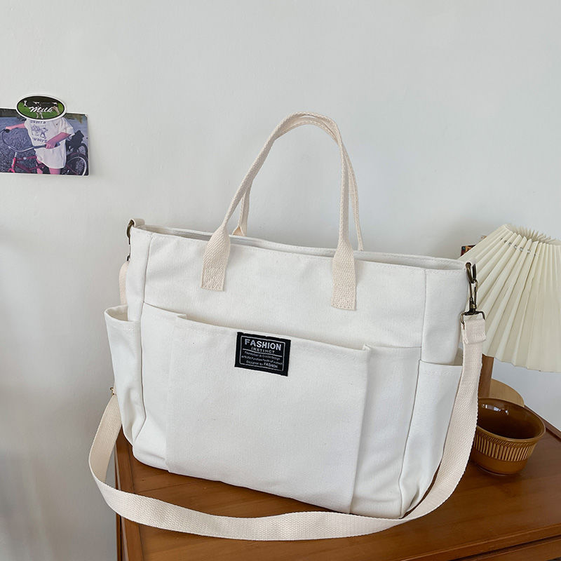 女性用大型キャンバストートバッグ、ミニマリストワークバッグ  - Canvas Tote Designer のレビューと価格